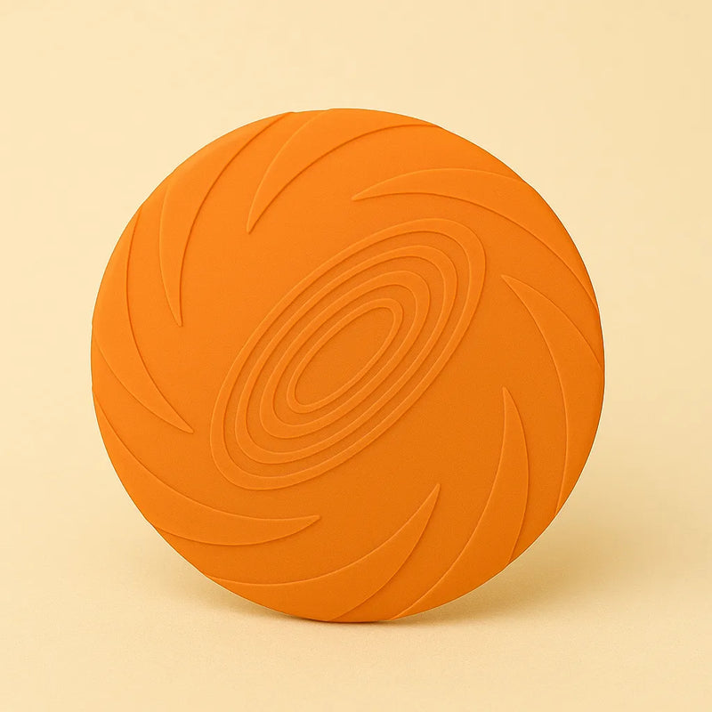 Frisbee arancione in gomma morbida per cani, ideale per giochi all’aperto e addestramento
